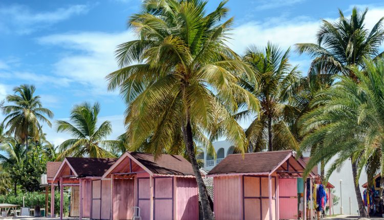 Pink beach huts on tropical Antigua island