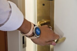 Ocean-Medallion-Close-up---Guest-Opening-Stateroom-Door