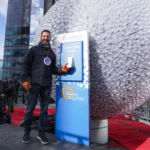 Carnival Cruise Line CEO Josh Weinstein at Times Square during the New Year’s Eve ball lighting ceremony promoting Cruise Into 2026.