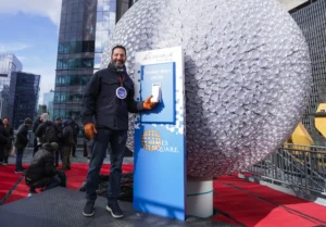 Carnival Cruise Line CEO Josh Weinstein at Times Square during the New Year’s Eve ball lighting ceremony promoting Cruise Into 2026.