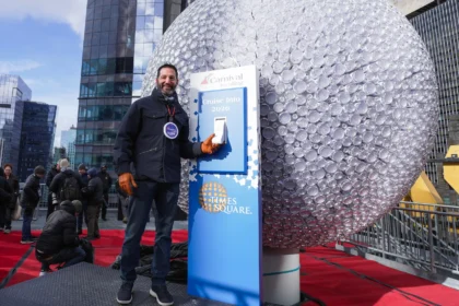 Carnival Cruise Line CEO Josh Weinstein at Times Square during the New Year’s Eve ball lighting ceremony promoting Cruise Into 2026.