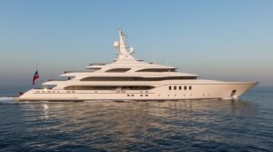 Side view of the 117-meter Lürssen superyacht Boardwalk displaying clean classical lines six decks and timeless elegance in luxury yacht architecture.