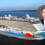 Norwegian Breakaway cruise ship sailing at sea with a portrait of Marc Kazlauskas, the newly appointed president of Norwegian Cruise Line, overlaid in the top-right corner