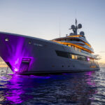 Royal Hakvoort-built superyacht Olmida illuminated at sea following its sale and renaming to Lady Maxine
