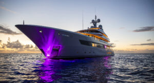 Royal Hakvoort-built superyacht Olmida illuminated at sea following its sale and renaming to Lady Maxine