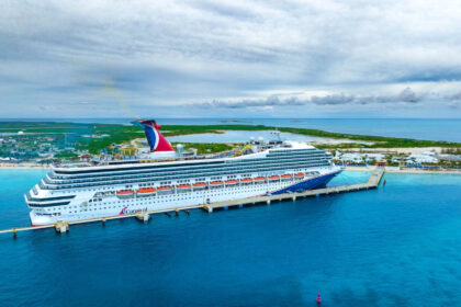 Carnival cruise ship sailing under stormy skies as winter weather impacts cruise schedules