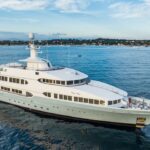 Feadship built 55 metre superyacht Olympus cruising at anchor after being sold