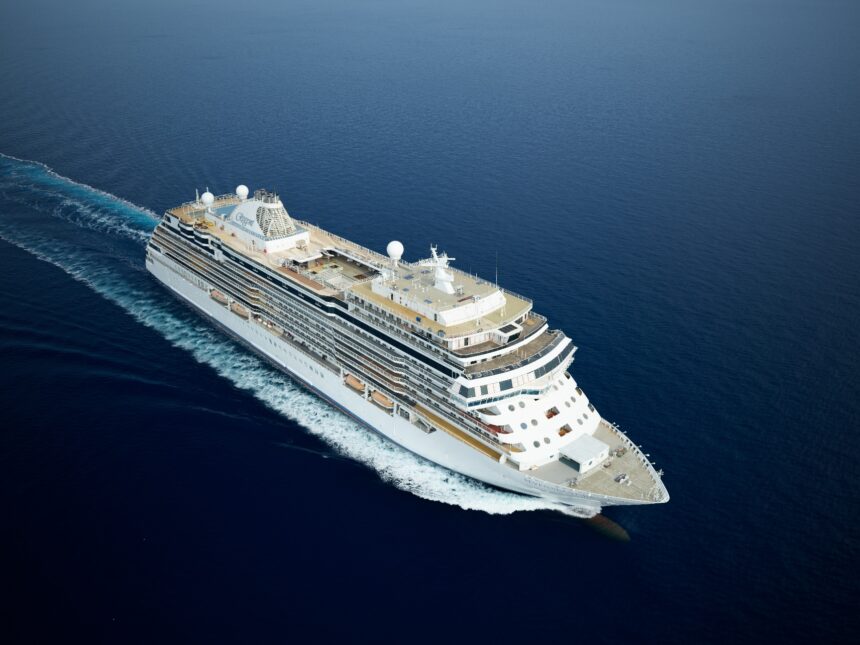 Regent Seven Seas Cruises luxury ship sailing at sea during free suite upgrade promotion
