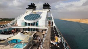 Seabourn Sojourn sailing during its 2026 world cruise, featuring open deck spaces and panoramic ocean views during a long-haul global voyage.