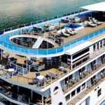 American Cruise Lines ship displaying USA 250th anniversary celebration branding